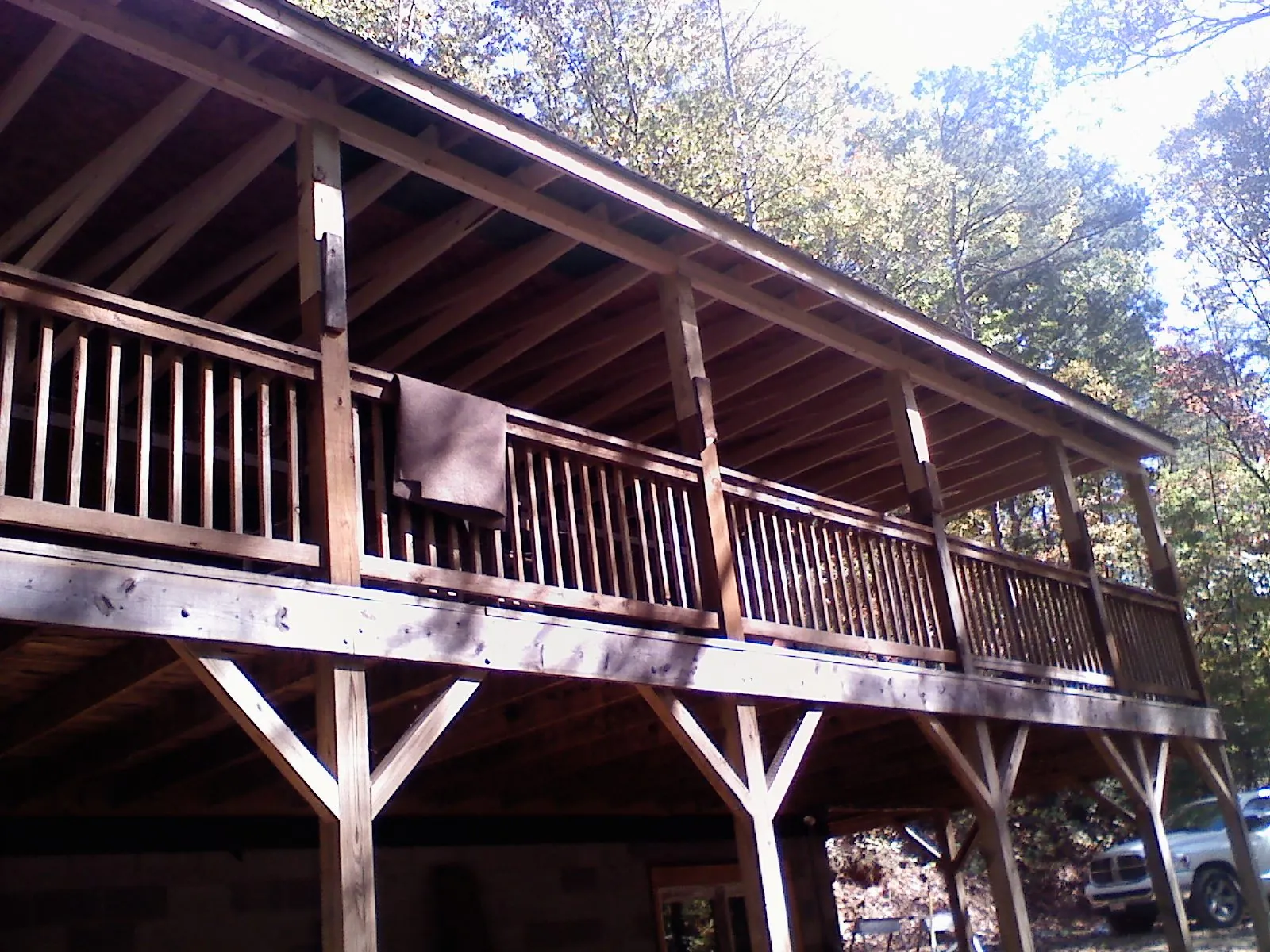 Timber framing under a new elevated porch and deck — Roof Leak Repair in Orient by Roofing Brothers